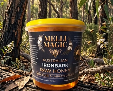Melli Magic Australian Ironbark Raw Honey in a jar on a log in a eucalyptus forest with bees.