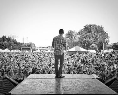 Dallas Smith overlooking a large crowd at Rock The Park in London, Ontario, Canada.