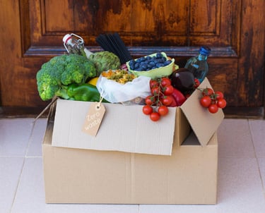 a box of vegetables and fruits in a box