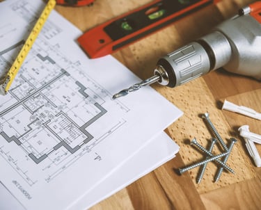 a drillet with screw screws and screws on a table