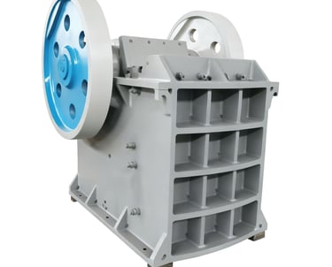 Stone crusher machine crushing large rocks into smaller aggregates at a quarry site.