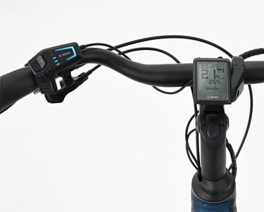 Bosch electric bike handlebar with digital Intuvia display and LED remote control on a white background.
