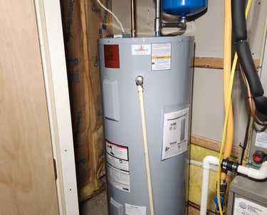 Newly installed electric water heater with safety valve in Rockville, MD residence