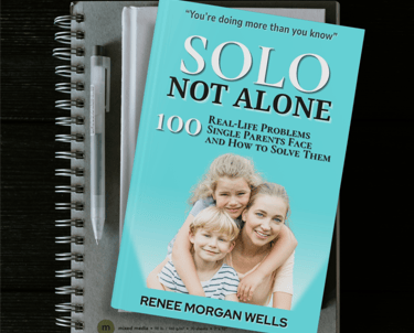 a book with a notepad and a pen