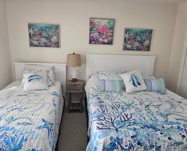 Guest bedroom with queen and twin beds