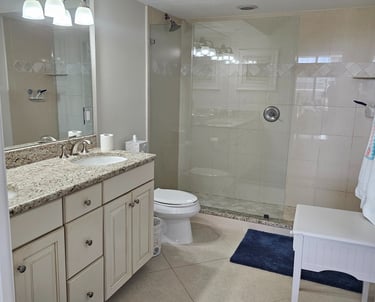 a large bathroom with a walk in shower