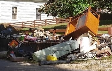 Image of an eviction clean-up that Guaranteed Junk Removal came in and cleaned. Furniture, clothes