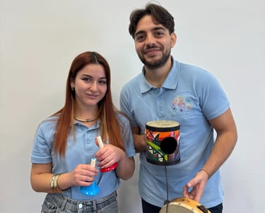 a man and woman standing next to each other