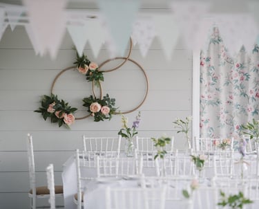 the ark northampton dressed for a wedding reception with white chairs and linen