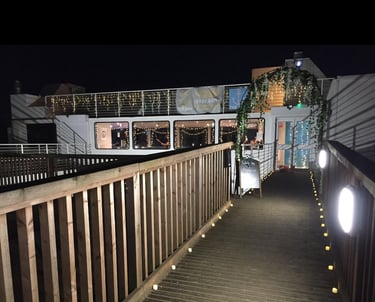 the ark northampton at nighttime, dressed for a wedding reception