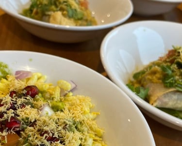 Three bowls of Indian food at a curry night at the ark northampton