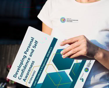 Custom-designed workbook for Worcestershire College, showcasing branding and typography.