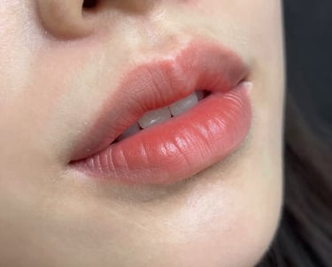 a field full of red and yellow flowers