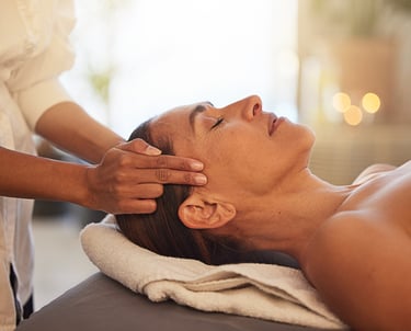a woman getting a facial