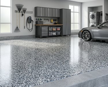 Shiny grey decorative flake epoxy garage floor coating in a modern organized garage with a sports car.