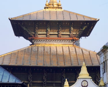 a large building with a golden dome on top of it