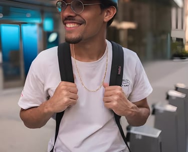 Close-up of a man wearing a blue baseball cap and glasses, smiling, embodying personalized guidance 