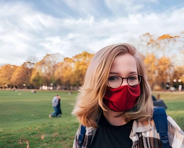 Woman with a red face mask standing in a park, representing the diverse global opportunities