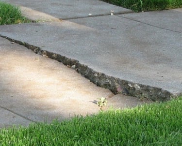 a fire hydrant sitting on the sidewalk