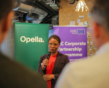 Corporate event videography team filming keynote