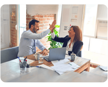 a man and woman giving high five fingers to each other