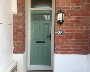 chartwell green door on red bricks and toplight with pulsar glass and antique black hardware