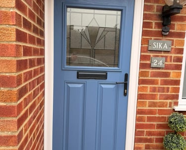 Pigeon Blue Composite Door Installed Near Hythe, Southampton - blue capri 1 composite front door with black hardware