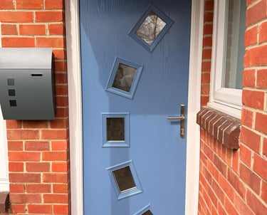 Pigeon blue front door with 5 glass panels in an arch fitted in Stubbington, Hampshire.