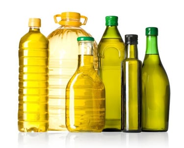 a variety of bottles of cooking oil