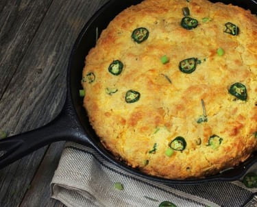Mexican Cornbread (Pan de Elote) in an iron skillet