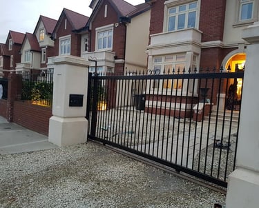 sliding gates in front of a house