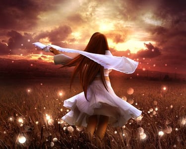 a woman in a white dress standing in a field