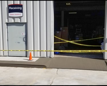 Concrete curb, and loading dock approach.