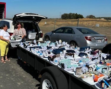 Picture of trailer full of bathroom kits for tiny homes at 4th & Hope