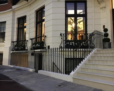 Elegant Victorian townhouse in London featuring bespoke wrought iron railings and balconettes by Ken