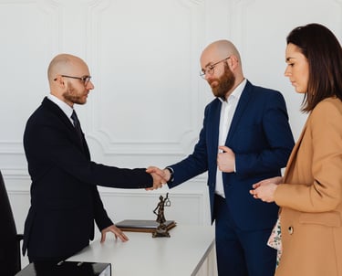 Business professionals shaking hands during a partnership meeting