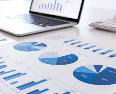Clean financial reports and charts showing organized bookkeeping and clear financial visibility.
