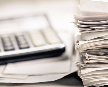 Disorganized bookkeeping records and receipts needing cleanup and catch-up bookkeeping services.