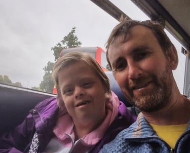 Image of Peter with smiling girl