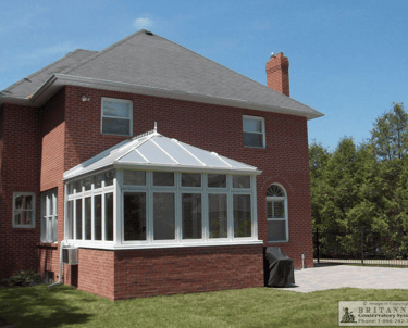 Conservatory with 4 season glass panels and polycarbonate roof.