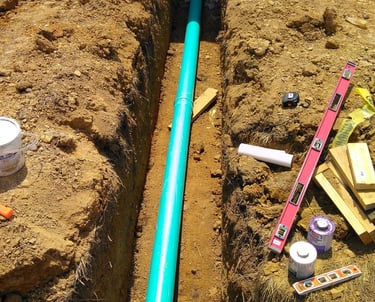 sewer line to building trench