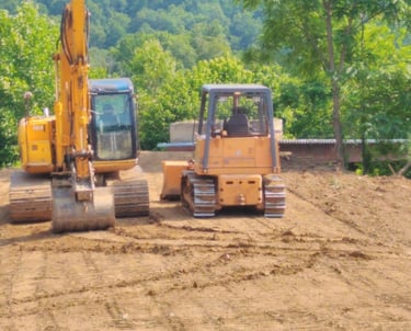 excavator and dozer getting ready to work