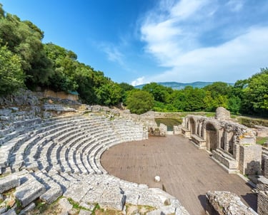 a large stone structure with a circular shaped seating area