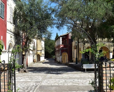 a gated in area with a bench and a bench