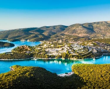 a view of a small island in the middle of a lake