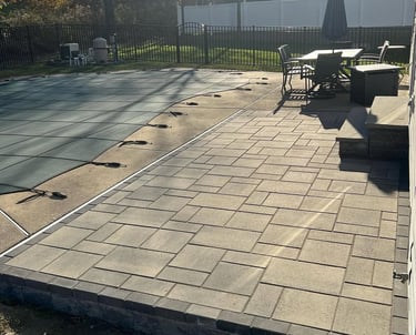 excellent landscaping and hardscaping of grass, stones and trees by NP Landscaping