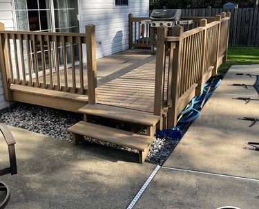 excellent landscaping and hardscaping of grass, stones and trees by NP Landscaping