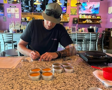 Salve class man making herbal salve