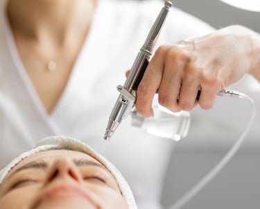 a woman getting her hair done by a professional hairdress