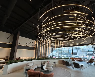 Office lobby lighting fixture hanging of the celling as decoration. Fm Electrical in dallas texas.